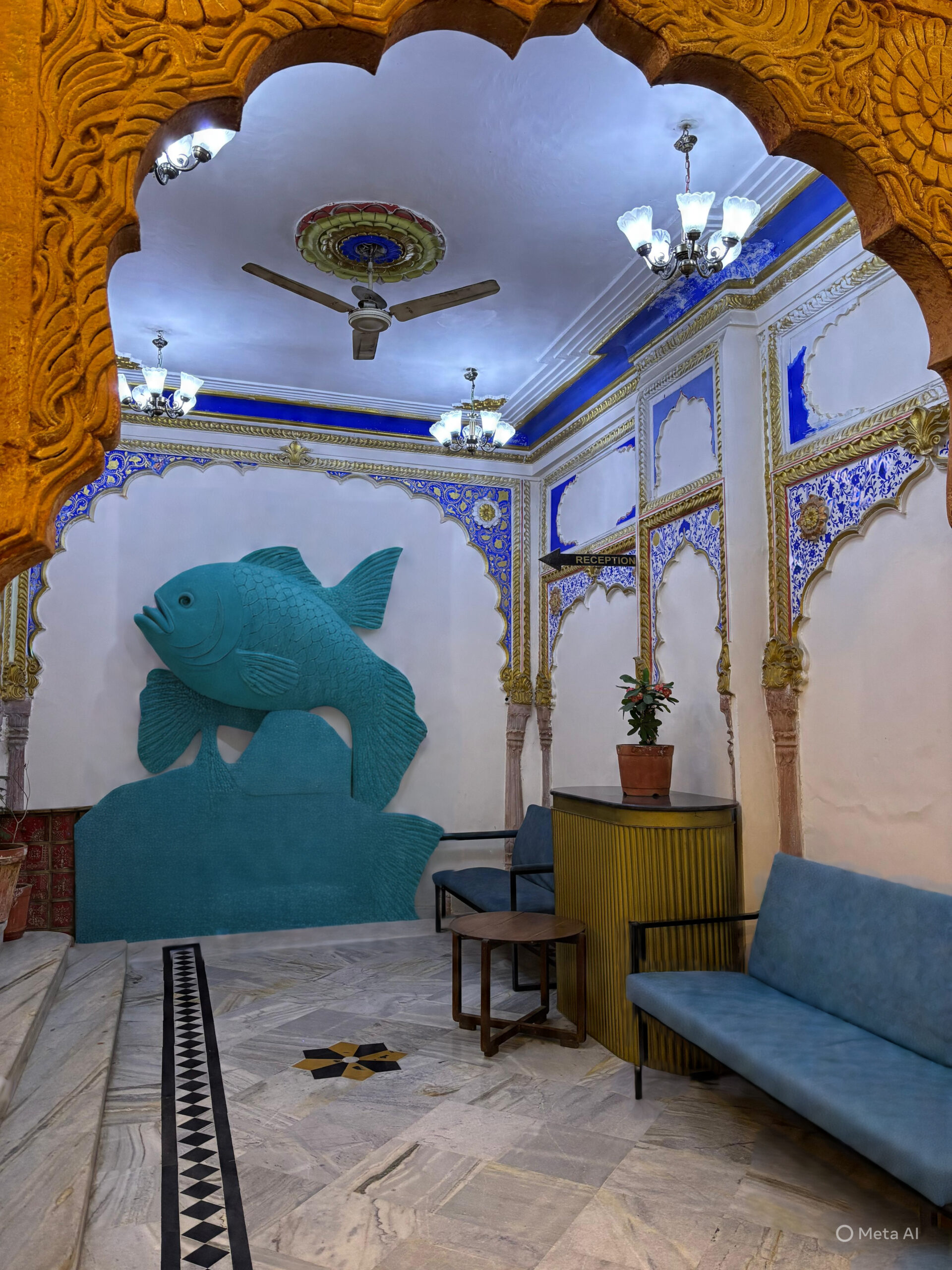 Heritage-style entrance of Hotel Royale Plazo with royal arches, artistic decor, and elegant seating area